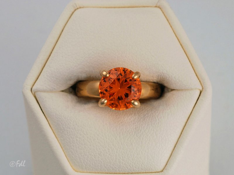 Bague en or 18 ct avec grenat mandarine